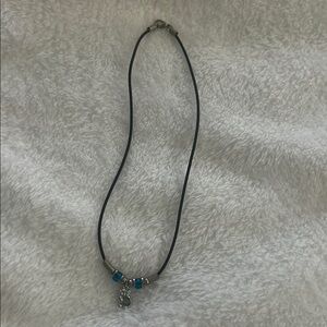 Black cord necklace with koala pendant and Blue and Silver details